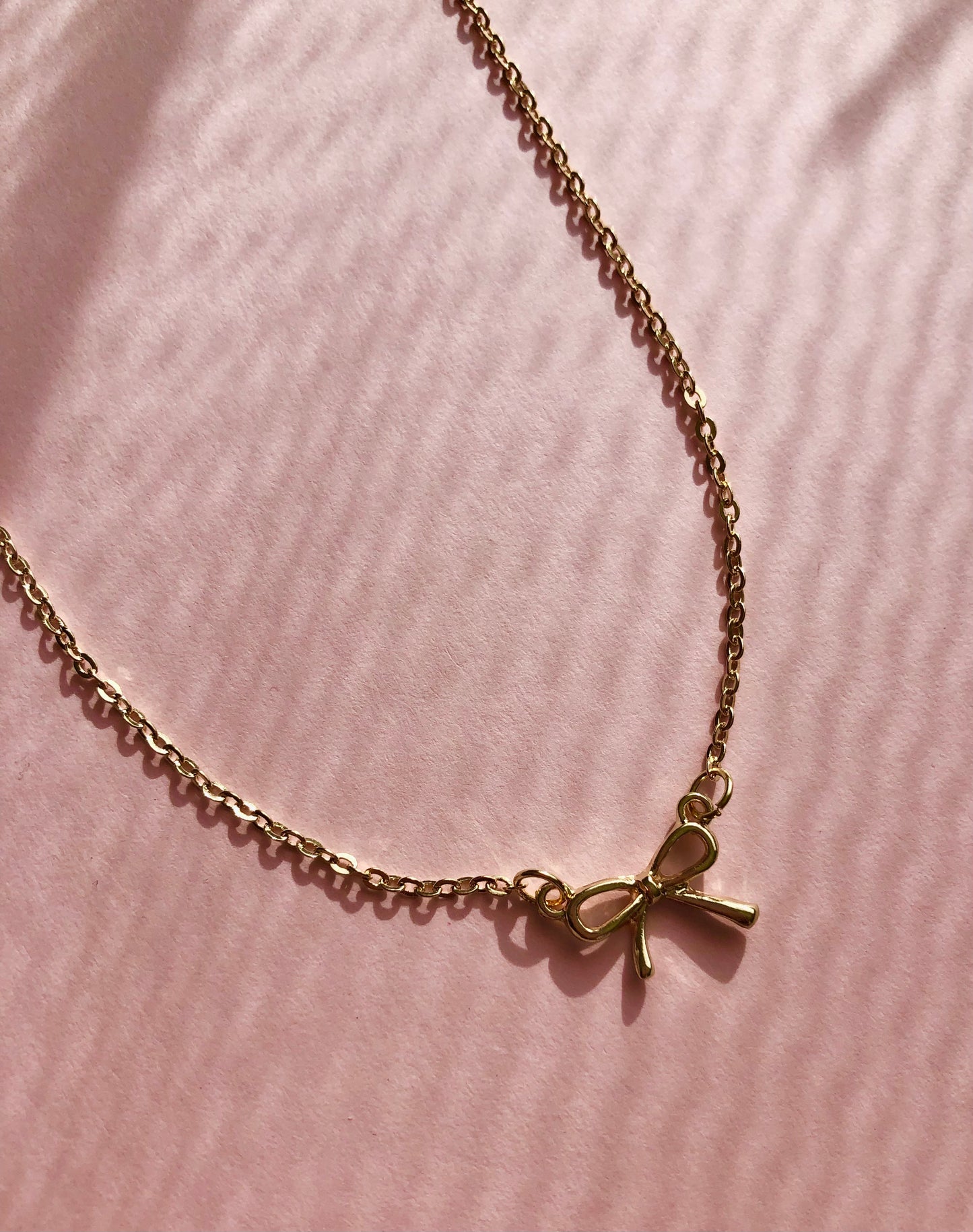 BOW PENDANT NECKLACE