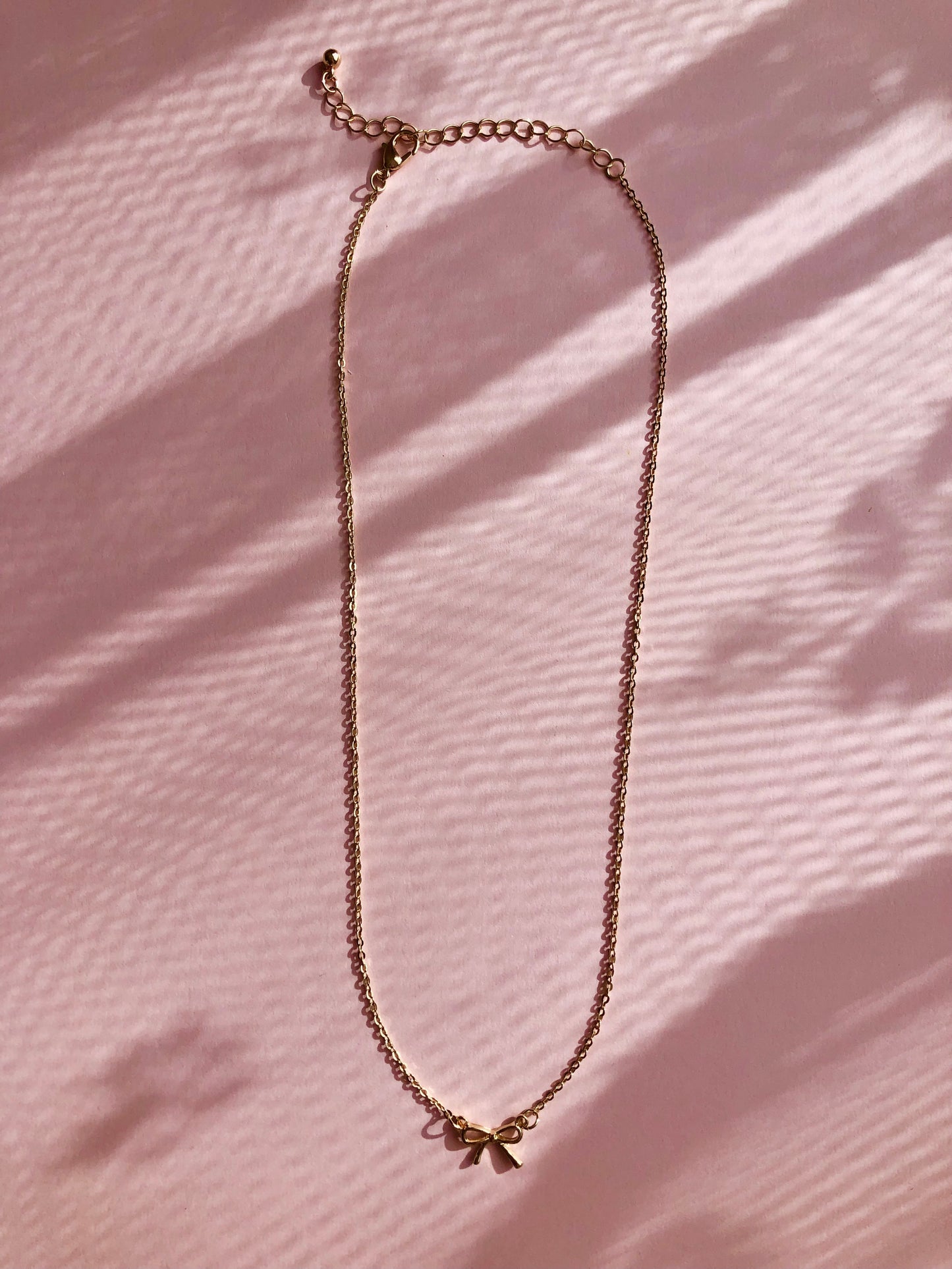 BOW PENDANT NECKLACE